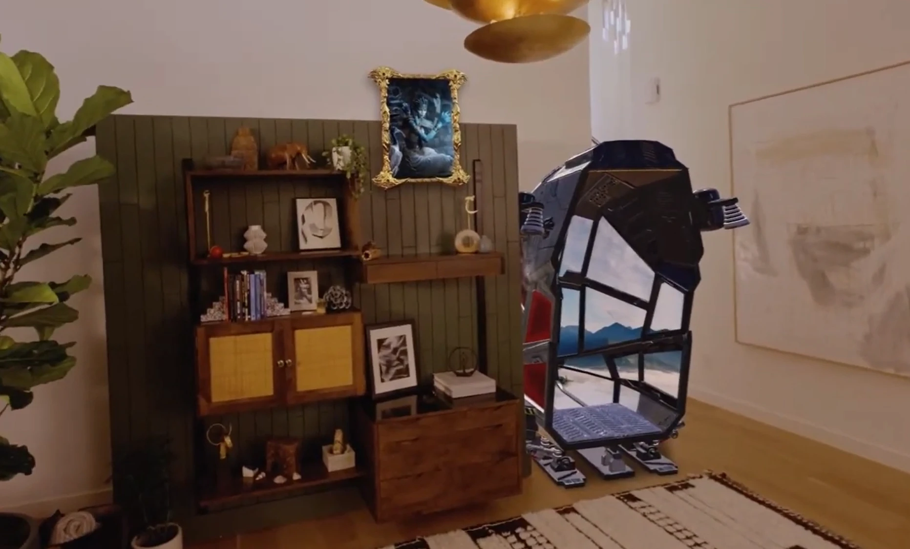 A hanging picture frame for Asgard's Wrath 2, and the interactive cockpit used to launch POPULATION: ONE.